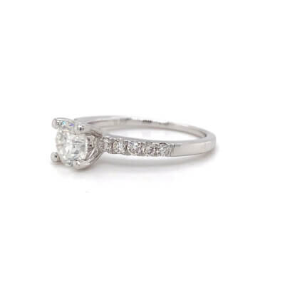 Pre-Owned 1.00ct Round Brilliant cut Diamond Engagement ring with Diamond set shoulders made in Platinum