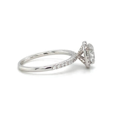 Pre-Owned 1.01ct Oval cut Diamond Engagement ring with Diamond set halo and shoulders made in 18ct White Gold