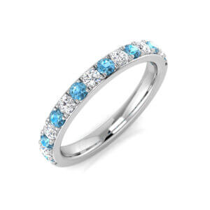 Pre-Owned Blue Topaz and Diamond Eternity Style ring made in 9ct White Gold