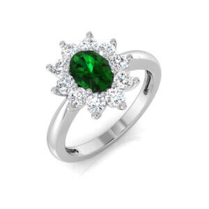 Pre-Owned Oval Emerald and Diamond cluster ring made in Platinum 0.64ct