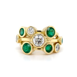 Pre-Owned Emerald and Diamond Scatter ring set in 18ct Yellow Gold